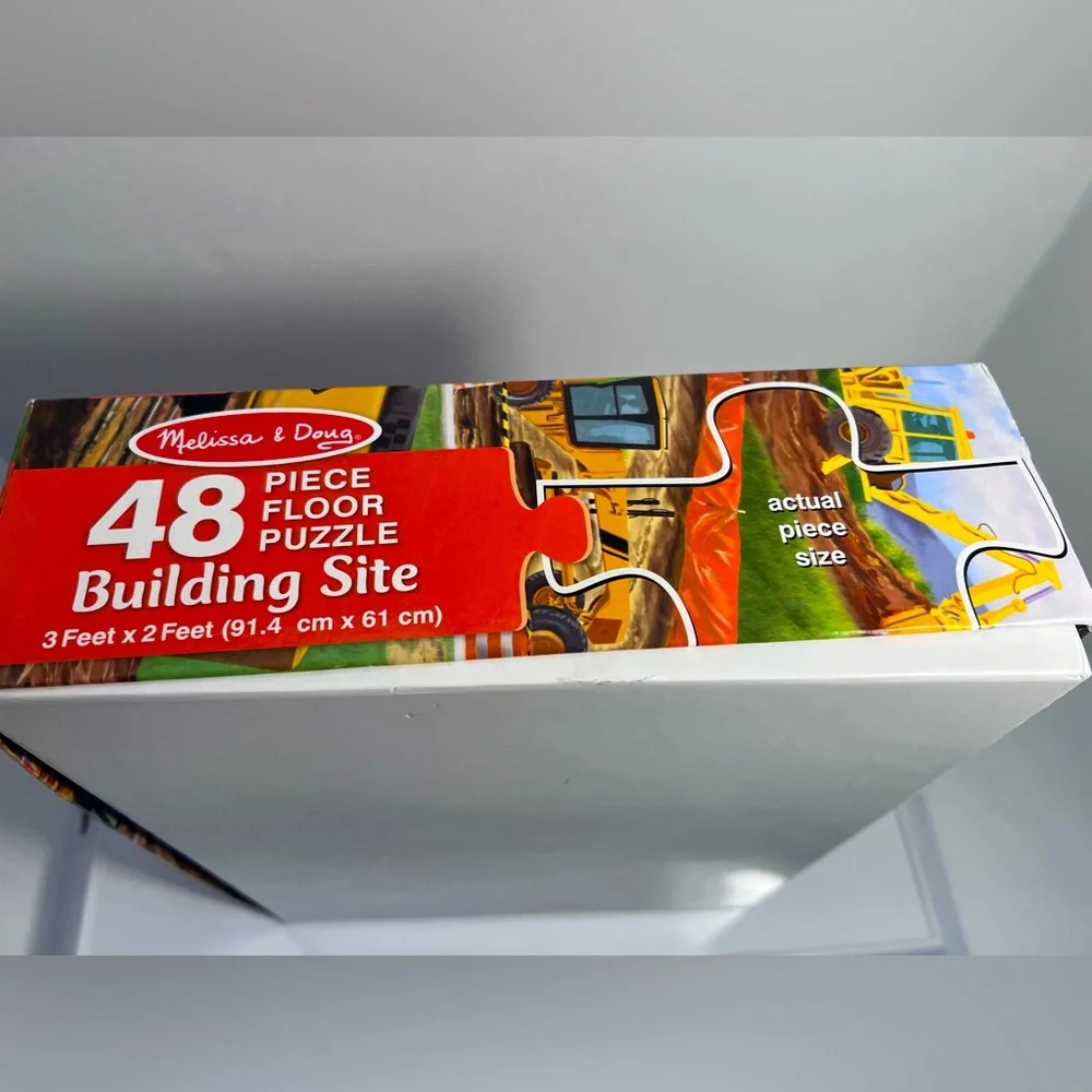This 48 Piece Construction Site Floor Puzzle is for Ages 4+ by Melissa & Doug.